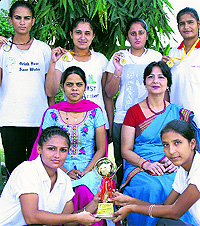 Judo players of BD Arya Girls College, Jalandhar Cantonment, with the principal after winning medals at the Inter-District Judo contest