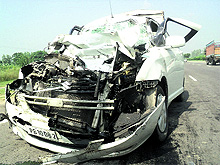 The mangled remains of a Swift car after it met with an accident near Khanna on Sunday