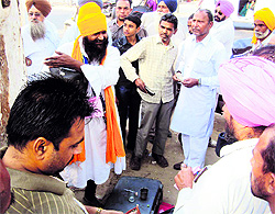 A quack sells medicines near the bus stand at Jagraon