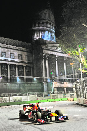 Red Bulls Sebastian Vettel powers to victory in the Singapore Formula One Grand Prix race on Sunday. 
