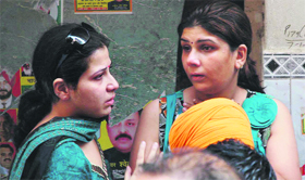 Shocked family members of the victim at the hospital.
