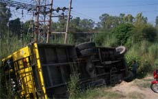 The bus that met with an accident on the Bathinda-Muktsar road on Monday.