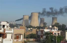 Smoke billows out of one of the chimneys of the Guru Nanak Dev Thermal Plant in Bathinda. 
