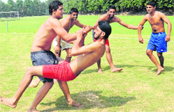 Players try to outwit each other during the ongoing Inter-College Circle Style Kabaddi Tournament for Boys (A-division) at Panjab University in Chandigarh on Monday. Tribune photo: Manoj Mahajan