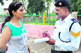A college girl being given traffic tips at the Pt Gobind Ballabh Pant Park stretch in Haridwar on Monday