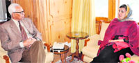 Governor NN Vohra at a meeting with Minister for Social Welfare Sakina Itoo in Srinagar on Monday. A Tribune photograph