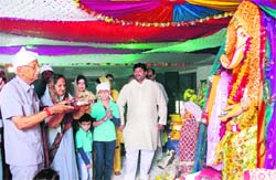 People celebrate Ganpati Mahotsav in Ludhiana on Monday.