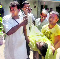 Nine persons were killed and at least 30 injured when a stampede broke out after devotees tried to rush through the gate of an Ashram in Deogadh in Jharkhand on Monday.