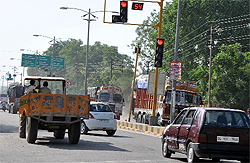 Vechicles jump red light with impunity at an intersection in Bathinda