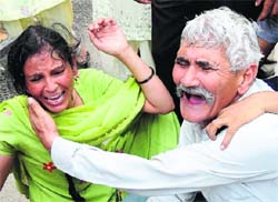 Inconsolable family members of the victim.
