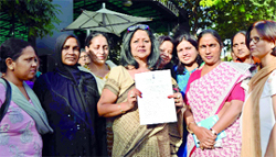 MLA and chairperson of the Delhi Commission for Women Barkha Singh poses with the memorandum that she gave to Police Commissioner Neeraj Kumar, demanding justice for the victim of sexual assault.