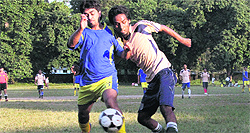 Players in action during the Dehradun District Football League in Dehradun on Tuesday