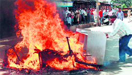 Relatives of a patient set furniture and equipment of a private hospital on fire at Dhankot village in Gurgaon district on Tuesday.