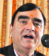 Khushi Ram Balnatah, BJP MLA, addresses mediapersons in Shimla on Tuesday.