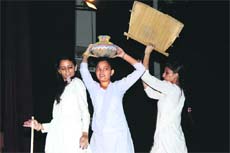 Students perform during a play at Government College for Women at Gandhi Nagar in Jammu on Tuesday. 