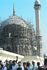 The portion of the dome where marble tiles came off.