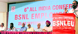 M Krishnan, general secretary of NFPE, addresses a conference in Ludhiana on Tuesday