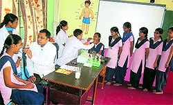 Doctors examine students at Victoria Public High School at Lehra, near Ahmedgarh, on Tuesday