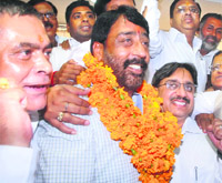 Jalandhar Mayor Sunil Jyoti celebrates along with Chief Parliamentary Secretary KD Bhandari (left) and other supporters on Tuesday.