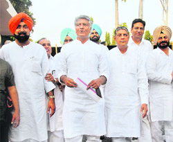 Congress Legislature Party leader Sunil Kumar Jakhar and party members at Punjab Raj Bhawan in Chandigarh on Tuesday. 