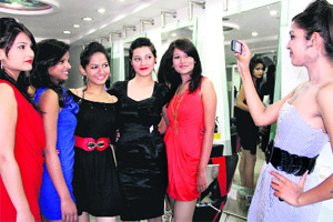 Participants in the Miss Radiant Skin contest pose for a photograph in Dehradun on Wednesday. 