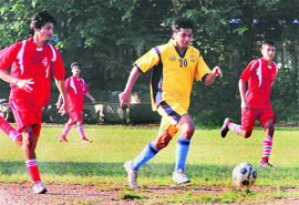 A match in progress during the Dehradun District Football League in Dehradun on Wednesday. 