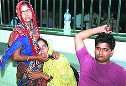 The deceased ASIs grieving relatives