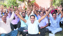 Representatives of the Punjab State Aided School Teachers and Other Employees Union hold a dharna in front of the Treasury Office in Jalandhar on Wednesday. Tribune Photo: Malkiat Singh