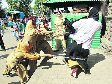 Police women hit nursing students with batons.