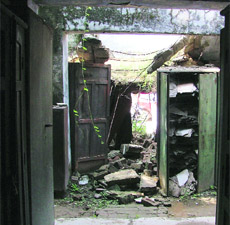 Almirahs containing official record lie in the midst of debris at a collapsed building in Ludhiana. 
