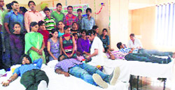 Volunteers donate blood during a camp organised by the NSS wing of GADVASU in Ludhiana on Wednesday. 