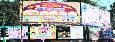 Illegal hoardings at Crystal Chowk in Amritsar. 