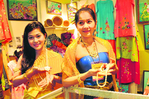 Girls from Thailand show ornaments during a trade show organised by the CII at Sector 28, Chandigarh, on Thursday.