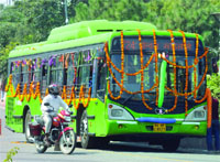A decorated woman ladies special DTC bus. Tribune photo: Manas Ranjan Bhui