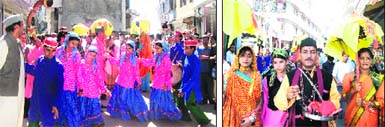 Folk artistes from Garhwal perform a traditional dance during the autumn fair in Mussoorie on Thursday; and (right) artistes dressed in ethnic attire.