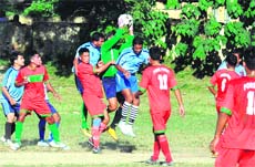 A match in progress during the Dehradun District Football League in Dehradun on Thursday. 