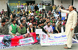 Indepent MLA Abdul Rasheed along with his supporters during a protest in Srinagar on Thursday