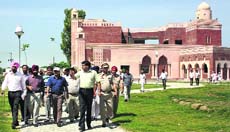 Sangrur Deputy Commissioner Kumar Rahul comes out after inspecting the work on Wada Ghallughara Kup Rohira Memorial near Ahmedgarh on Thursday. 