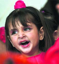 A girl takes part in a cultural function at BCM School in Ludhiana on Thursday.