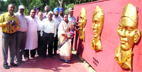 Family members of Shaheed Rajguru and BK Dutt pay floral tributes at the National Martyrs Memorial, Hussainiwala, on Thursday.