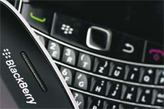 Research in Motion, the struggling maker of BlackBerry smartphones, reported a smaller-than-expected quarterly loss in the run-up to the launch of its make-or-break line of next generation devices. 