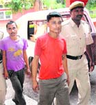 The accused in police custody in Chandigarh on Friday. 