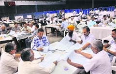 Counting of votes polled during the Senate elections in progress at Panjab University in Chandigarh on Friday. 