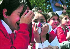 Students of the Convent of Jesus and Mary mourn the death of Nancy and Sakshi in Shimla on Friday.