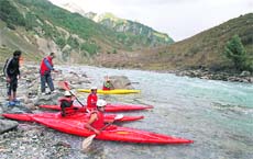 Participants at the national White Water Slalom Kayaking and Canoeing Championship in Srinagar on Friday. 