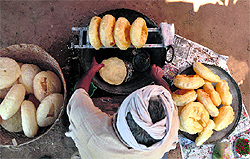 A vendor prepares sweets at Chhapar Mela on Friday