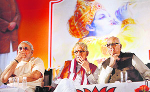 (From left) Gujarat CM Narendra Modi with BJP leaders Murli Manohar Joshi and LK Advani in Surajkund, Faridabad, on Friday. 