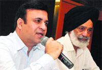 Sanjay Chugh, Chairman-cum-MD, Chandigarh Greenfields, announces the launch of Acme Alvista project in Chandigarh