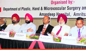 Experts at a national conference on hand surgery in Amritsar on Saturday.