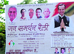A hoarding of the Jan Samarthan Rally to be held on Sunday is without Prime Minister Manmohan Singhs photograph